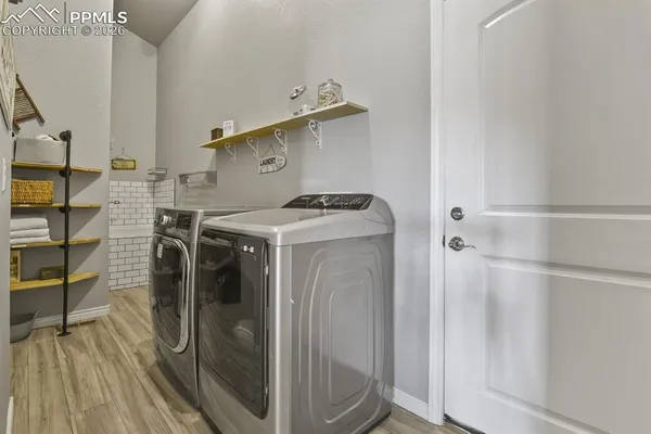 a utility room with washer and dryer