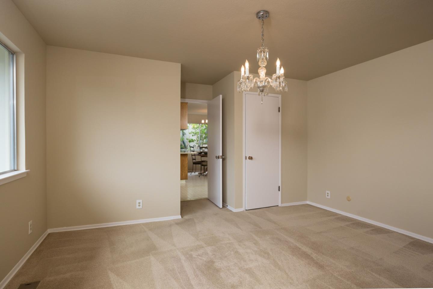 2960 Ribera Road Carmel, CA 93923 - Photo 12 of 19 a view of a chandelier in big room and a chandelier