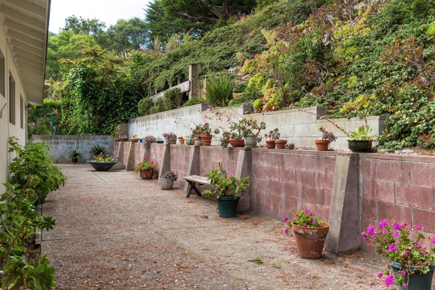 2960 Ribera Road Carmel, CA 93923 - Photo 16 of 19 a garden view with a seating space