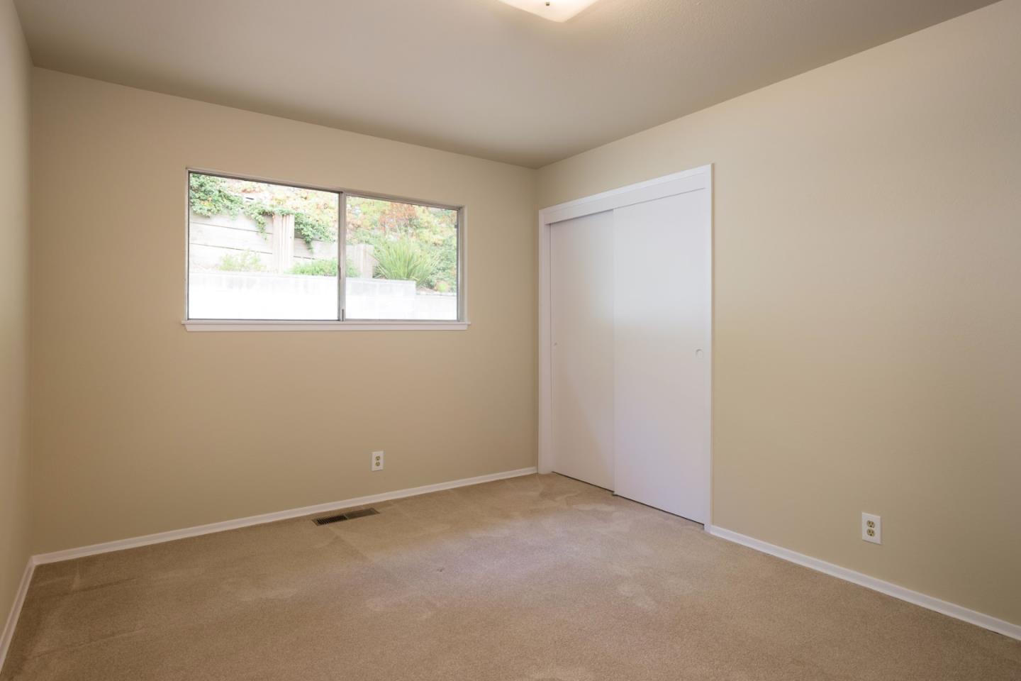 2960 Ribera Road Carmel, CA 93923 - Photo 19 of 19 an empty room with a window