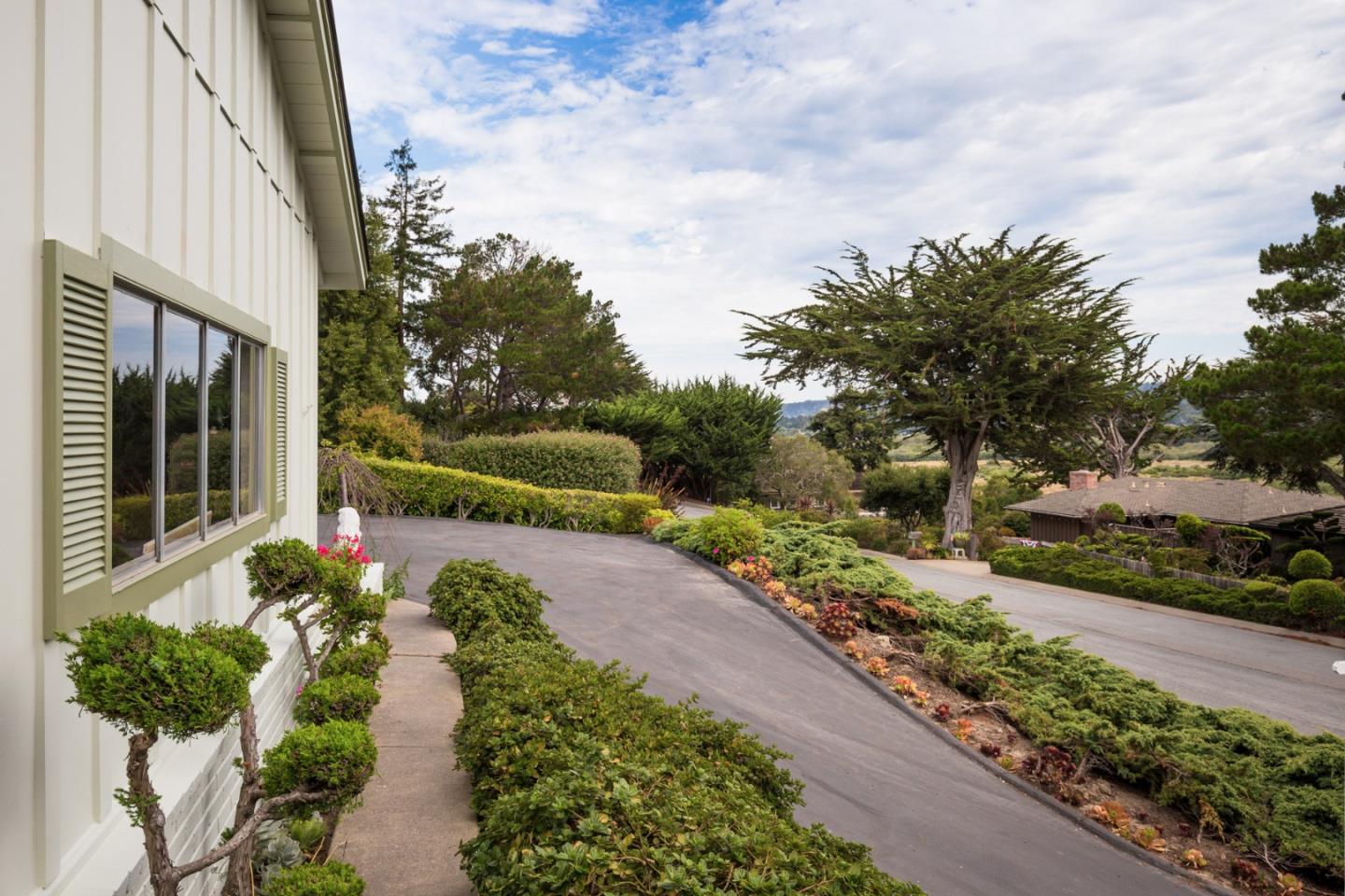 2960 Ribera Road Carmel, CA 93923 - Photo 4 of 19 a view of a garden with pathway