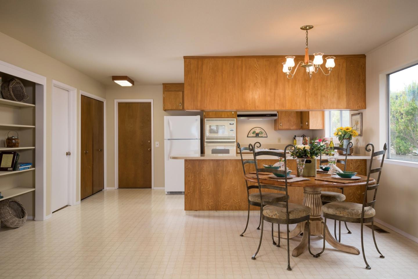 2960 Ribera Road Carmel, CA 93923 - Photo 5 of 19 a view of a dining room with furniture and window