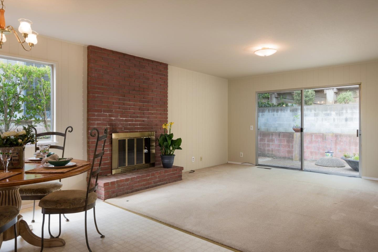 2960 Ribera Road Carmel, CA 93923 - Photo 8 of 19 a living room with furniture and a fireplace