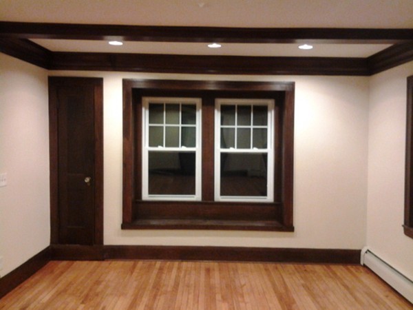 7 St Elmo Road Worcester, MA 01602 - Photo 14 of 17 a view of a brick house with wooden floor and a window