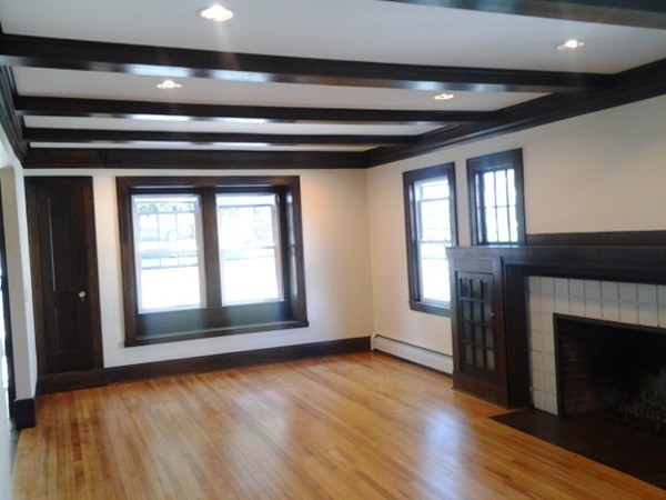 7 St Elmo Road Worcester, MA 01602 - Photo 5 of 17 an empty room with wooden floor and windows