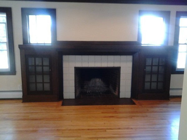 7 St Elmo Road Worcester, MA 01602 - Photo 6 of 17 a living room with furniture and a fireplace