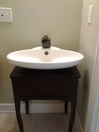 7 St Elmo Road Worcester, MA 01602 - Photo 7 of 17 a bathroom with a sink and a mirror