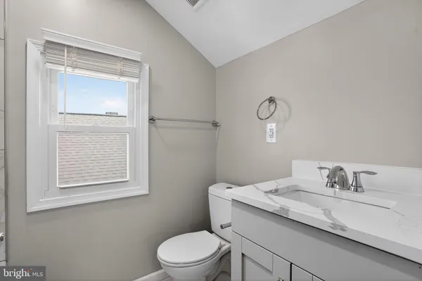 a view of a small space with wooden floor