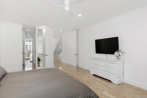 a view of a workspace with furniture and a gate