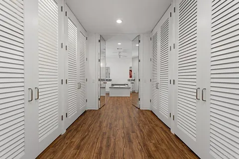 a bathroom with a bathtub a sink and a window