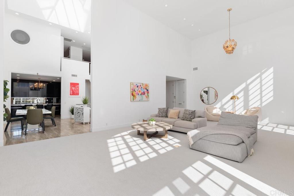 7429 Via De Fortuna Carlsbad, CA 92009 - Photo 3 of 47 a living room with furniture window and wooden floor