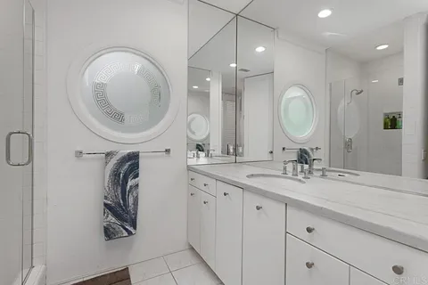 an aerial view of residential houses and outdoor space