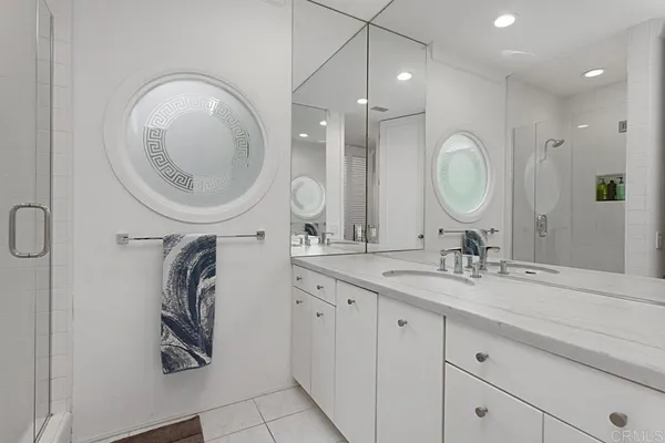 an aerial view of residential houses and outdoor space