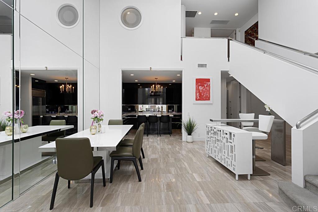 7429 Via De Fortuna Carlsbad, CA 92009 - Photo 8 of 47 a large kitchen with a table and chairs