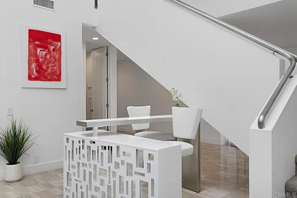 a view of balcony with furniture