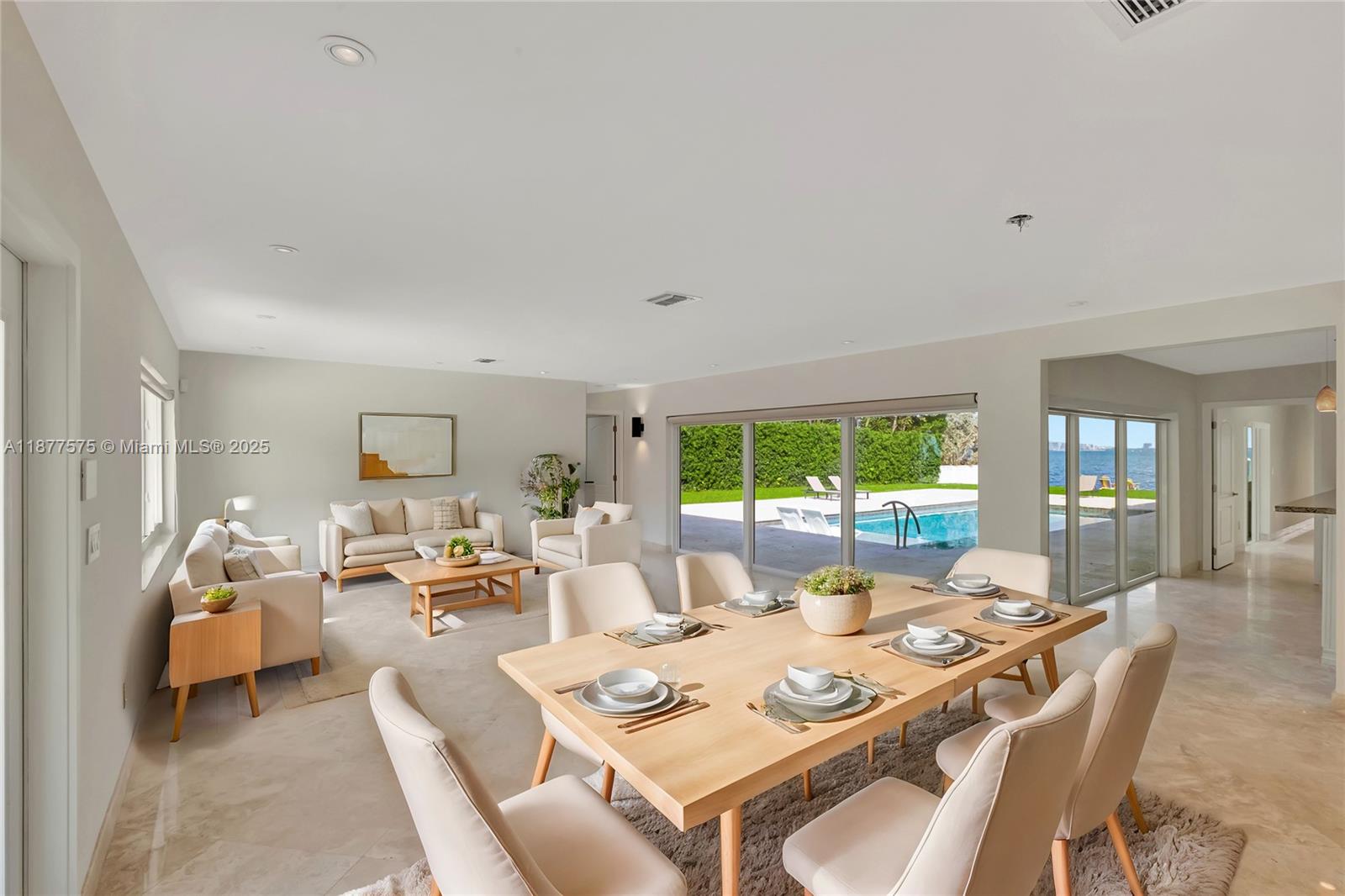 200 Harbor Drive Key Biscayne, FL 33149 - Photo 6 of 16 a living room with furniture and a large window