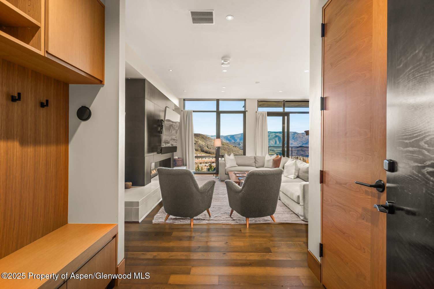 a view of a living room and dining room with furniture
