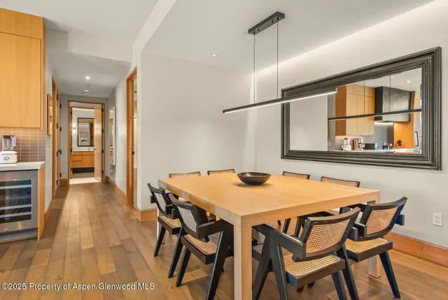 a bed room with a bed and a large window