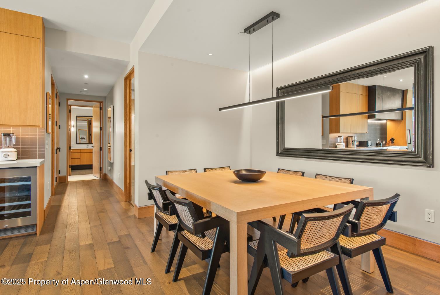 77 Wood Road, Unit 603 Snowmass Village, CO 81615 - Photo 17 of 45 a dining room with furniture and window