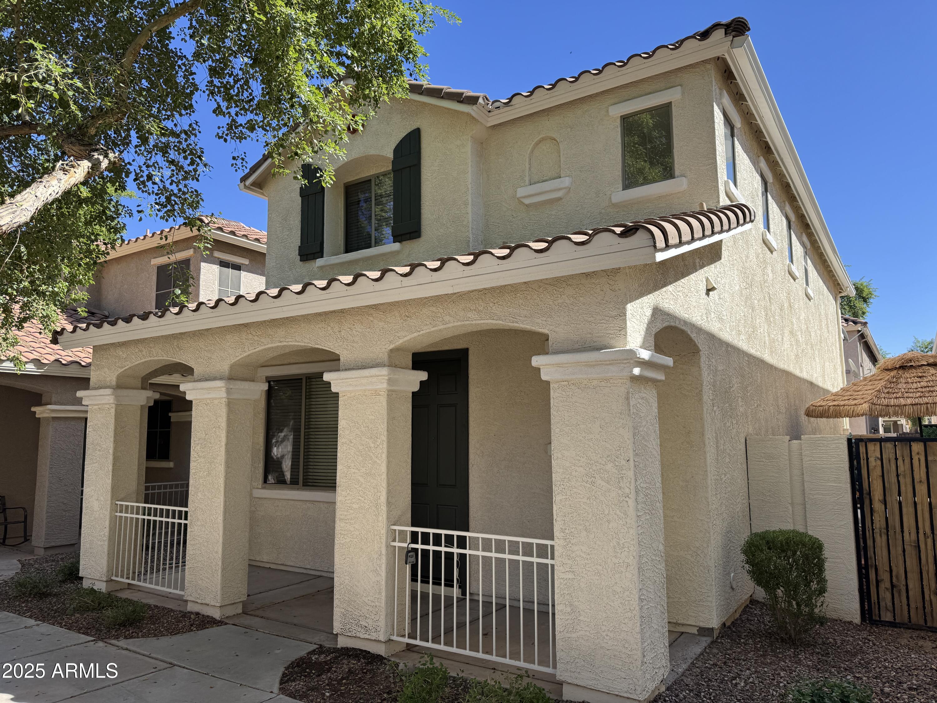 a front view of a house with a garage