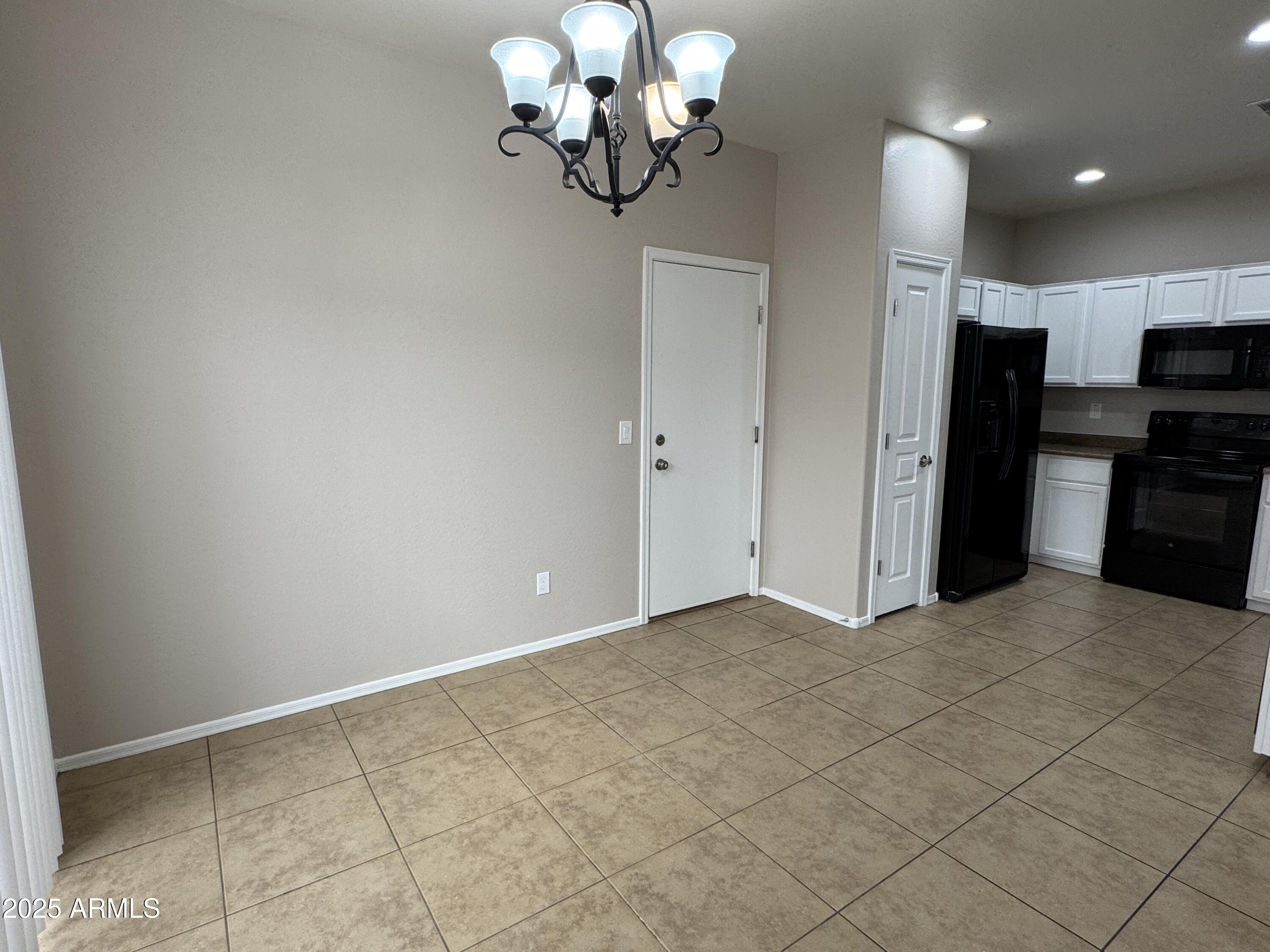 3822 East Santa Fe Lane Gilbert, AZ 85297 - Photo 5 of 24 a view of kitchen with chandelier