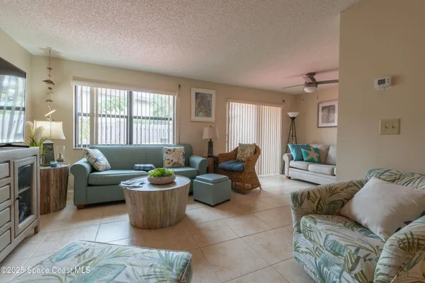 a living room with furniture and a window