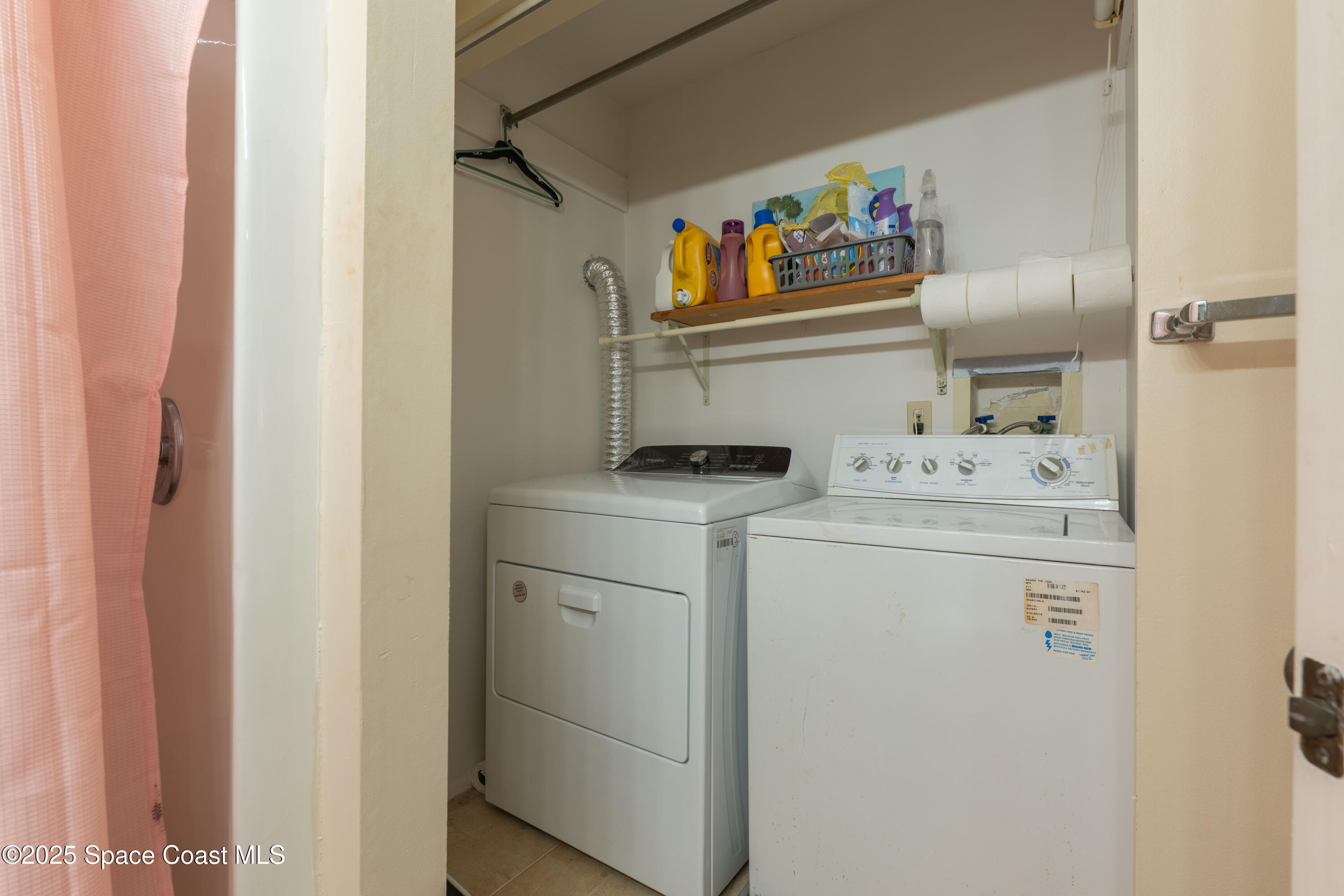 3222 Beach View Way Melbourne Beach, FL 32951 - Photo 25 of 31 a utility room with dryer and washer