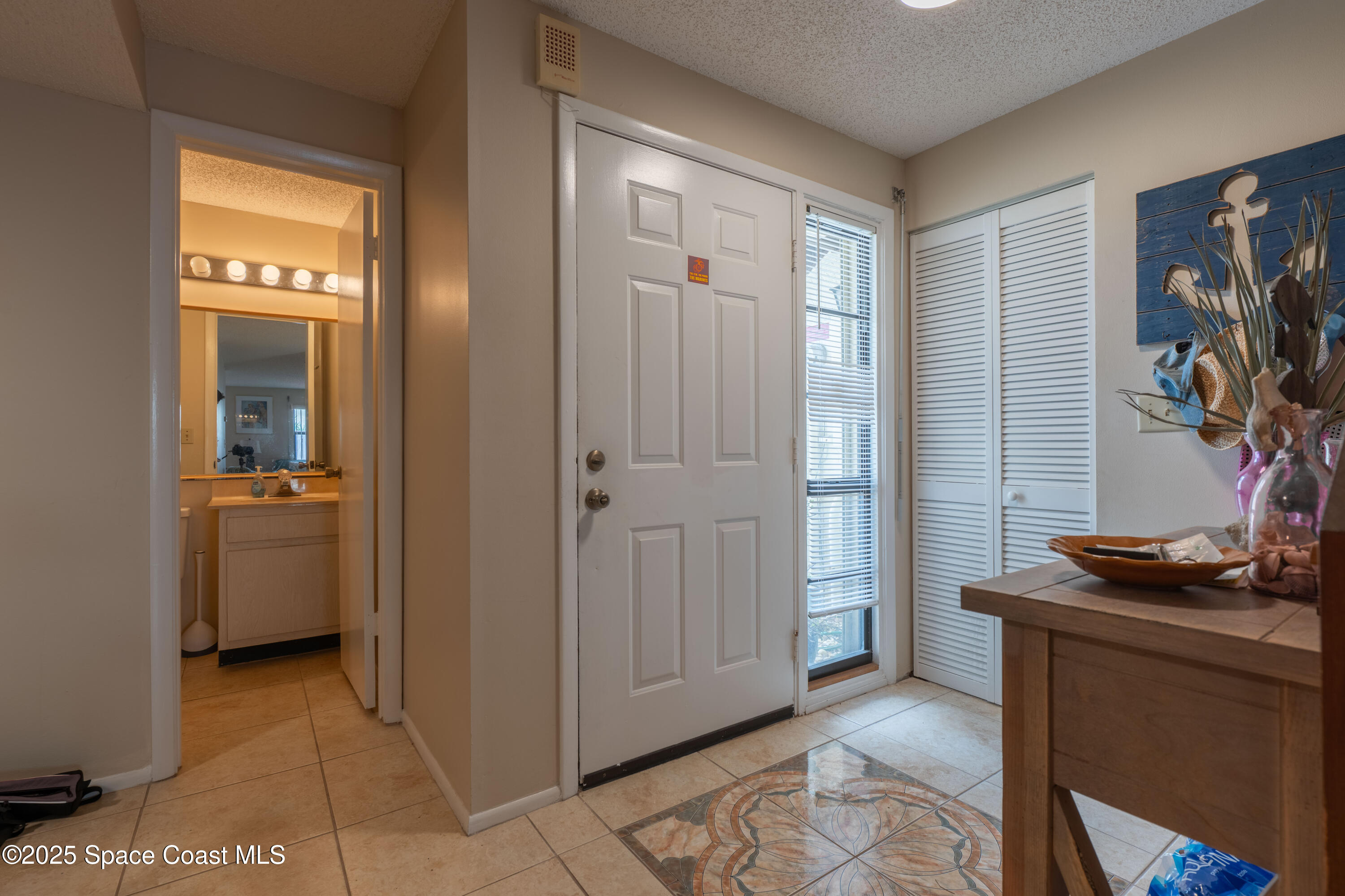 3222 Beach View Way Melbourne Beach, FL 32951 - Photo 3 of 31 a view of a storage & utility room