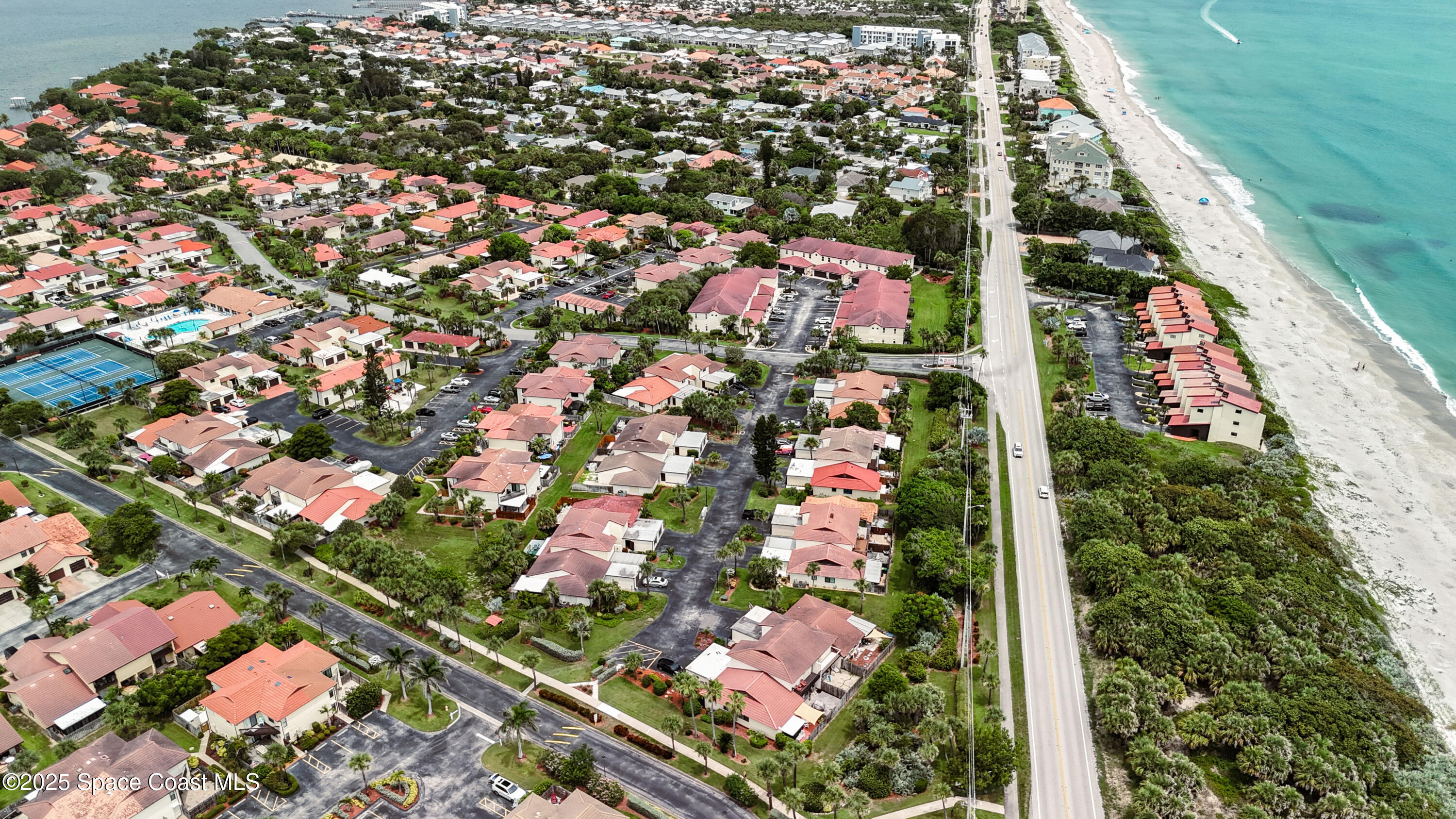 3222 Beach View Way Melbourne Beach, FL 32951 - Photo 31 of 31 an aerial view of residential houses with yard