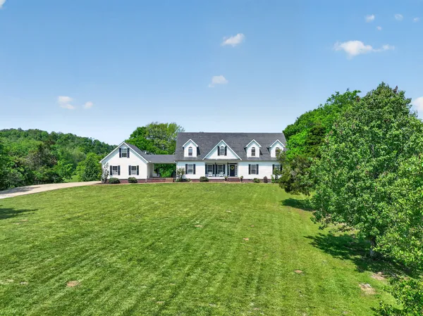 a view of a house with a big yard