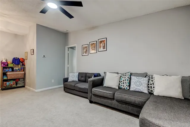 a living room with furniture and a couch