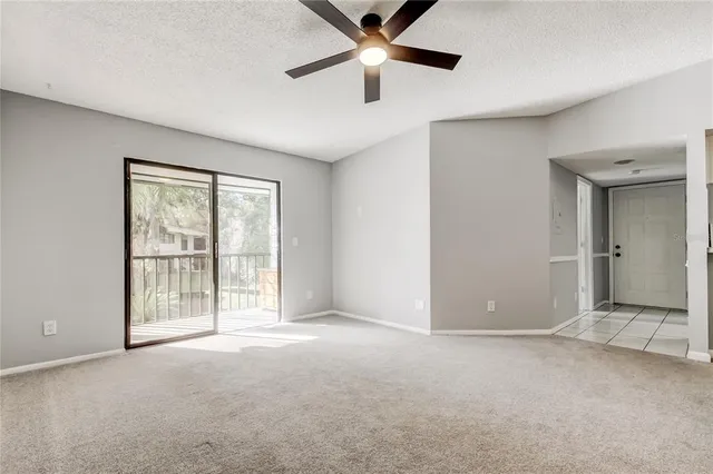 a bathroom with a sink a toilet a mirror a bathtub and shower