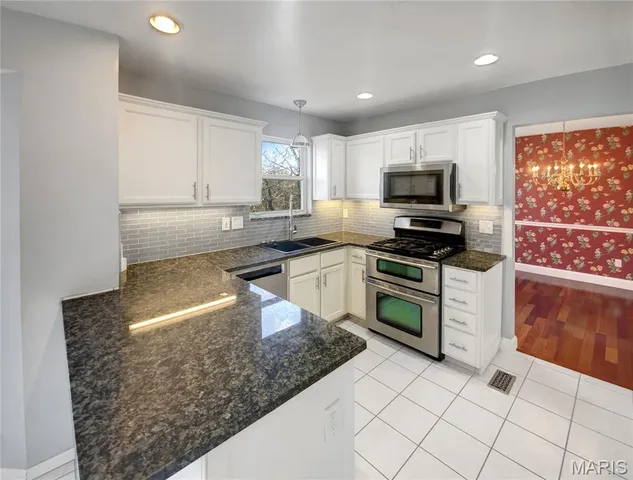 $485,000 | 326 Woodlawn Terrace Court, Ballwin, MO 63021