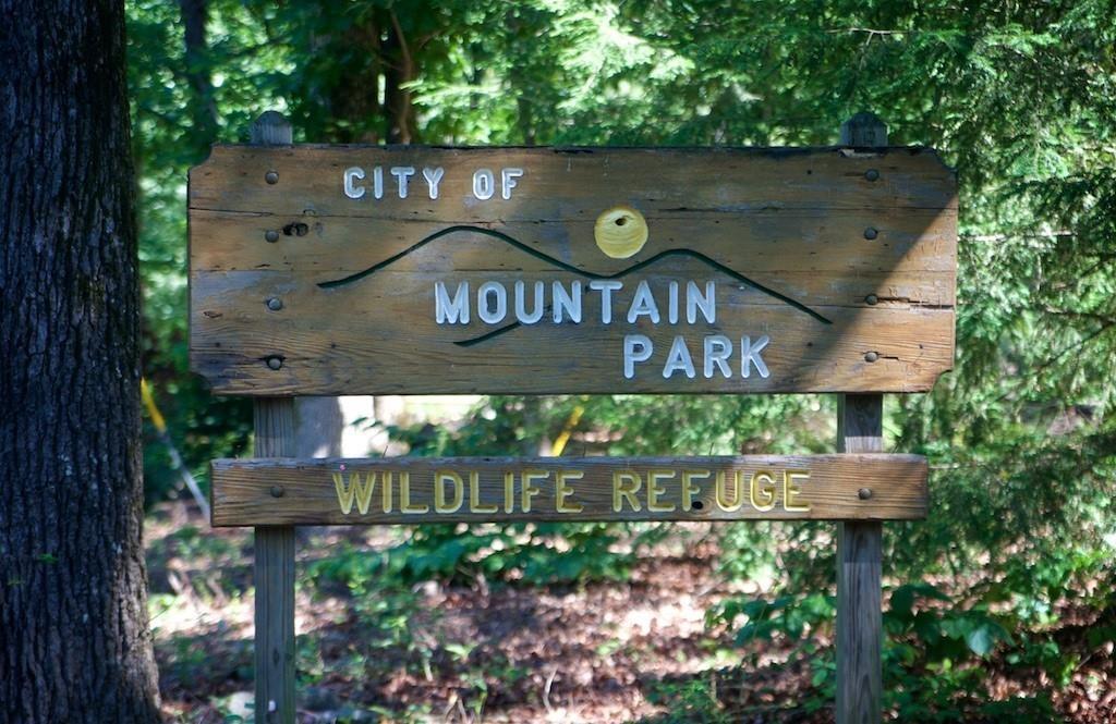 112 Cherry Street Roswell, GA 30075 - Photo 9 of 9 an outdoor space with wooden benches