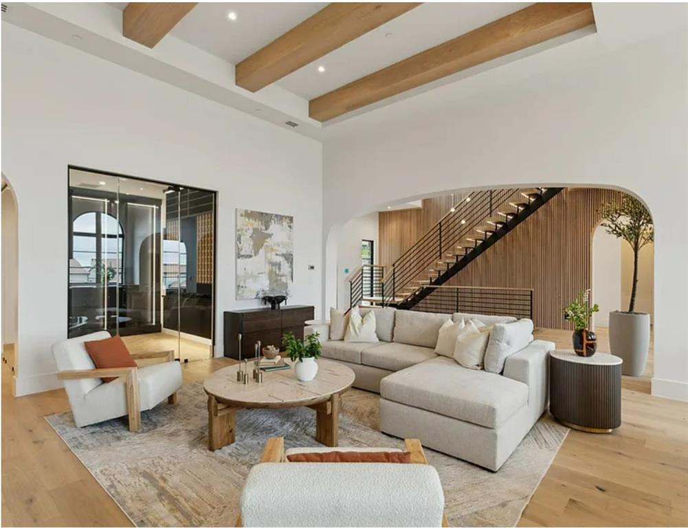 13713 Trail Creek Place Dallas, TX 75240 - Photo 9 of 15 a living room with furniture and wooden floor