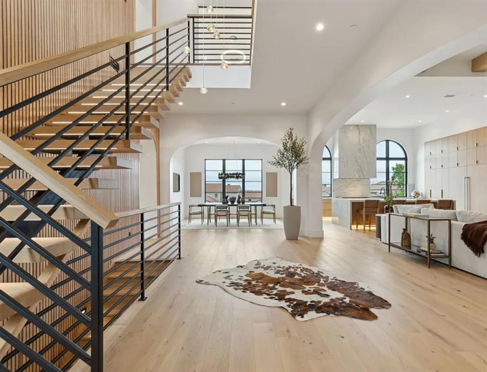 13713 Trail Creek Place Dallas, TX 75240 - Photo 10 of 15 a view of entryway livingroom and hall with wooden floor