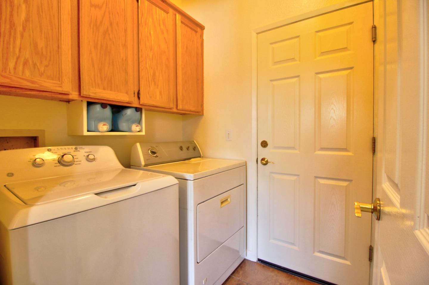 1833 Rail Street Manteca, CA 95337 - Photo 17 of 33 a utility room with dryer and washer