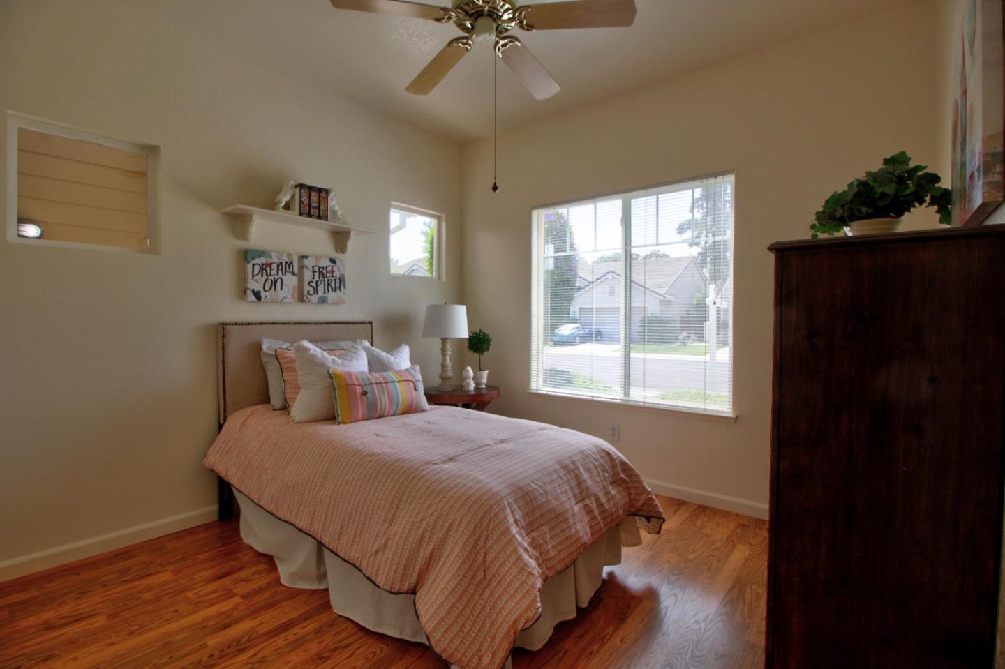 1833 Rail Street Manteca, CA 95337 - Photo 20 of 33 a bedroom with a bed and a window