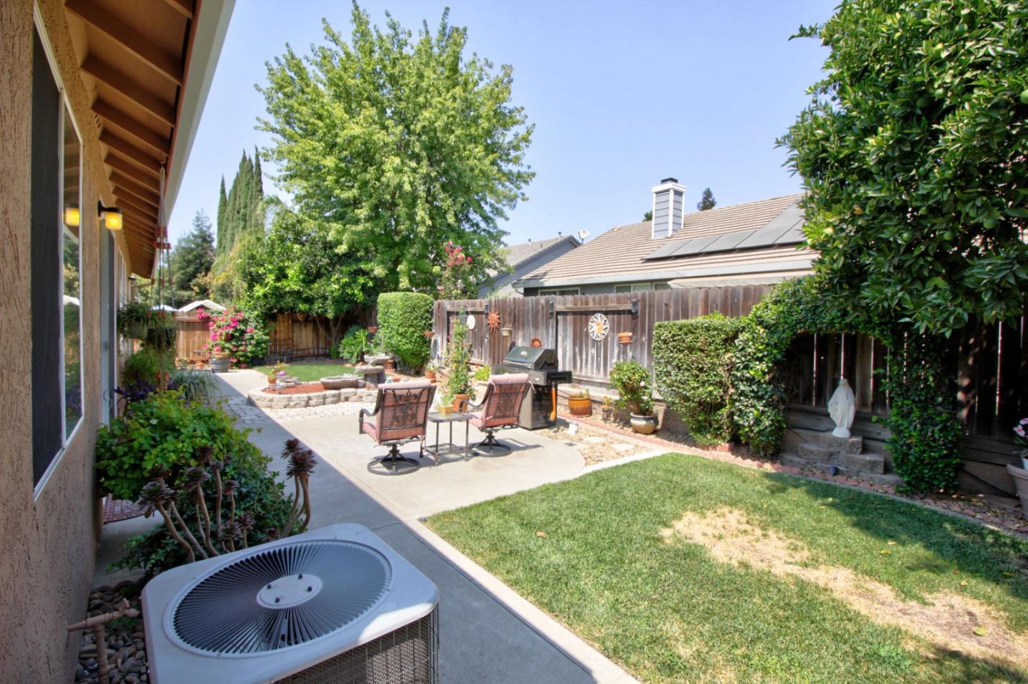 1833 Rail Street Manteca, CA 95337 - Photo 27 of 33 a view of an house with backyard and sitting area