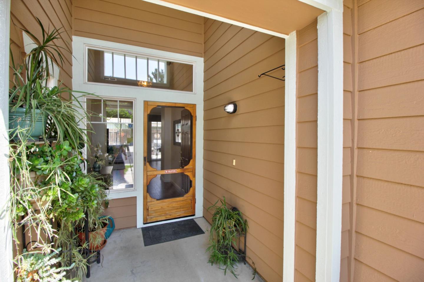 1833 Rail Street Manteca, CA 95337 - Photo 4 of 33 a front view of a house with a yard