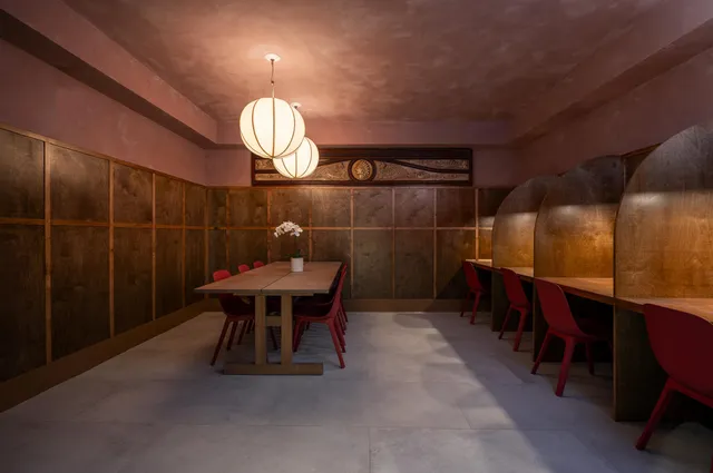 a view of a dining table and chairs in the room