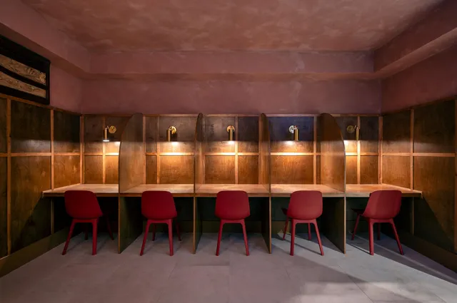 a view of a chairs and table in a room