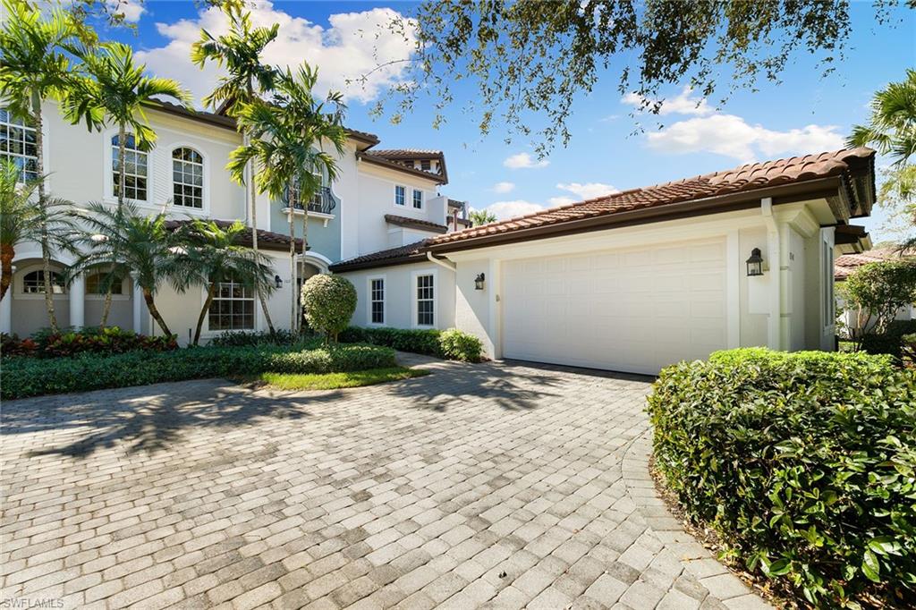 28540 Calabria Court, Unit 102 Naples, FL 34110 - Photo 6 of 32 a view of backyard of house with outdoor seating
