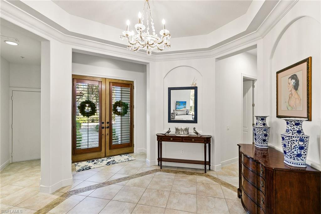 28540 Calabria Court, Unit 102 Naples, FL 34110 - Photo 10 of 32 a view of hall way with furniture