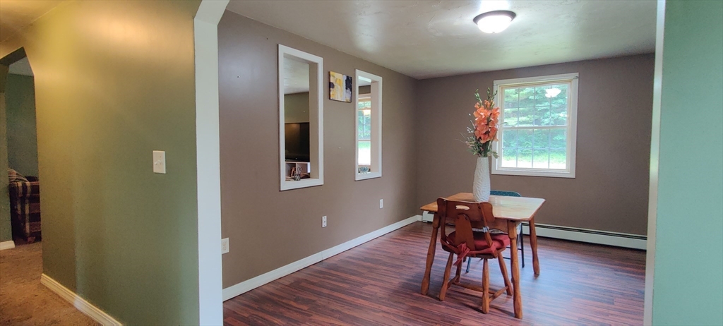143 Fiskdale Road Brookfield, MA 01506 - Photo 9 of 20 a workspace with wooden floor