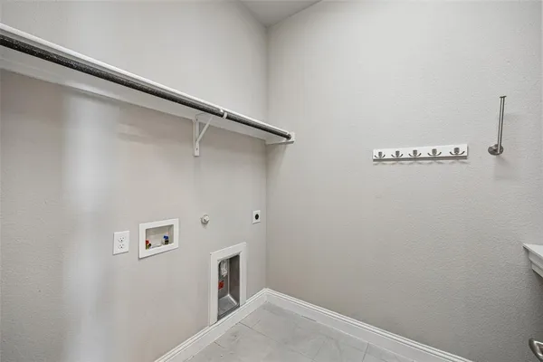 a view of a hallway with closet