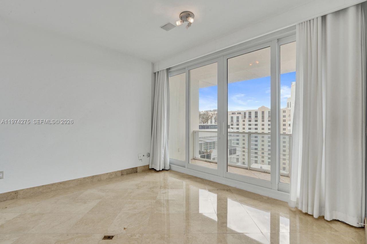 100 Lincoln Road, Unit PH12 Miami Beach, FL 33139 - Photo 20 of 59 a view of an empty room with a window