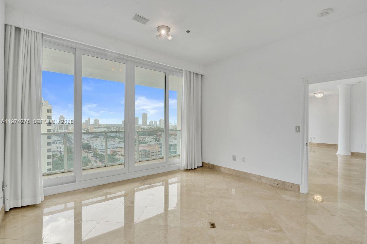 100 Lincoln Road, Unit PH12 Miami Beach, FL 33139 - Photo 21 of 59 a view of an empty room with a window