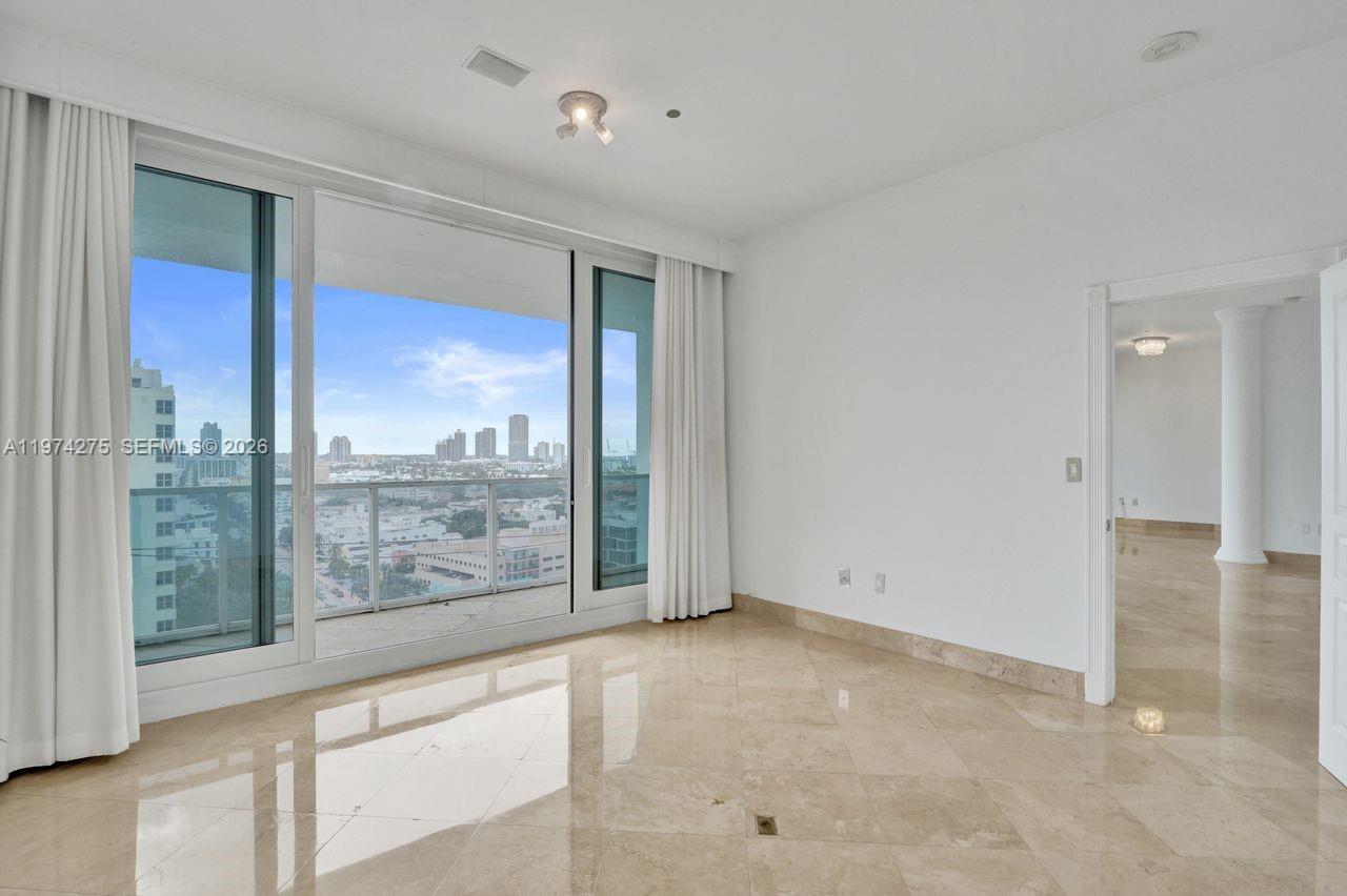 100 Lincoln Road, Unit PH12 Miami Beach, FL 33139 - Photo 23 of 59 a view of an empty room with a window