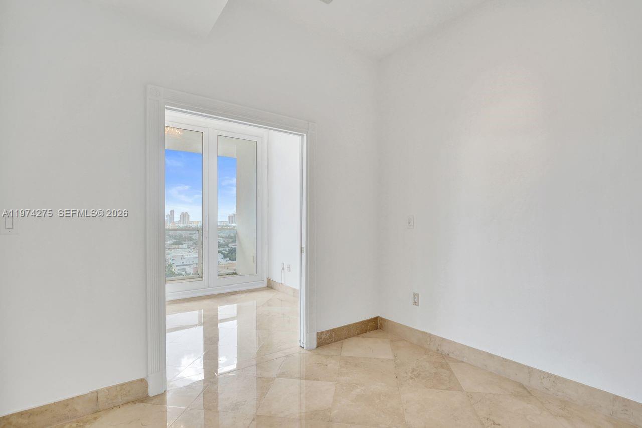100 Lincoln Road, Unit PH12 Miami Beach, FL 33139 - Photo 31 of 59 a view of an empty room and window